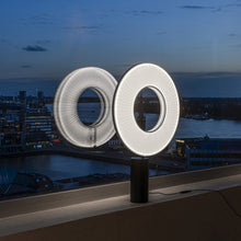 Load image into Gallery viewer, Iris LED Table Lamp in living room.