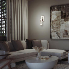 Load image into Gallery viewer, Sia LED Wall Light in living room.