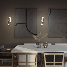 Load image into Gallery viewer, Sia LED Wall Light in living room.
