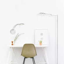 Load image into Gallery viewer, Dessau Arch LED Wall Light in living room.