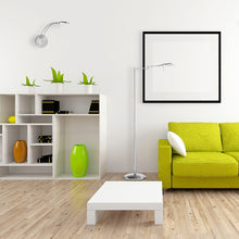 Load image into Gallery viewer, Dessau Arch LED Wall Light in living room.