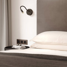 Load image into Gallery viewer, Lucca LED Surface Wall Light in bedroom.