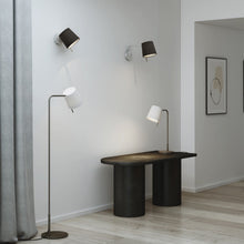 Load image into Gallery viewer, Mitsu LED Swing Arm Wall Light in living room.