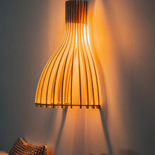 Load image into Gallery viewer, Ariel Wall Light in bedroom.