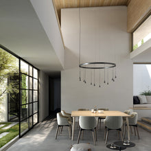 Load image into Gallery viewer, Skybell LED Pendant Light in living room.