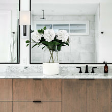Load image into Gallery viewer, Brent Wall Light in bathroom.