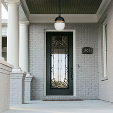 Load image into Gallery viewer, Capsule Outdoor Pendant Light in Outside Area.
