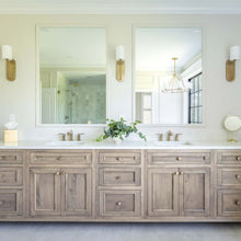Load image into Gallery viewer, Preston Wall Light in bathroom.