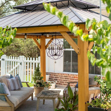 Load image into Gallery viewer, Solaris Outdoor Chandelier in Outside Area.