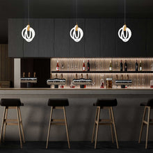Load image into Gallery viewer, Knot LED Pendant Light in kitchen.