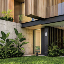 Load image into Gallery viewer, Acropolis Outdoor LED Wall Light in Outside Area.