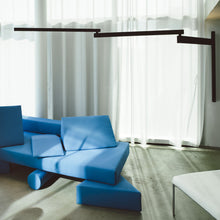 Load image into Gallery viewer, Black Flag LED Wall Light in living room.
