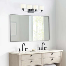 Load image into Gallery viewer, Canfield Vanity Wall Light in bathroom.