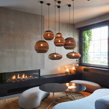 Load image into Gallery viewer, Disc Pendant Light in living room.