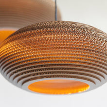 Load image into Gallery viewer, Disc Pendant Light in Detail.