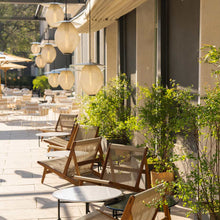Load image into Gallery viewer, Satellite Outdoor Pendant Light in Outside Area.
