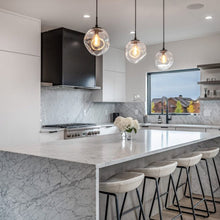 Load image into Gallery viewer, Aster LED Pendant Light in kitchen.