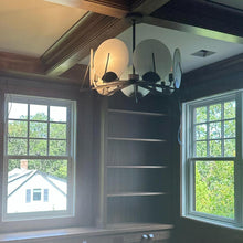 Load image into Gallery viewer, Callisto Pendant Light in living room.