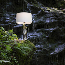 Load image into Gallery viewer, Rivulet Table Lamp in Outside Area.