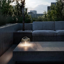 Load image into Gallery viewer, Aqu Outdoor LED Portable Table Lamp in Outside Area.