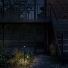 Load image into Gallery viewer, Lix Spike Outdoor LED Solar Bollard in Outside Area.