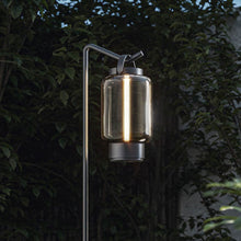 Load image into Gallery viewer, Qu Outdoor LED Portable Table Lamp in Outside Area.