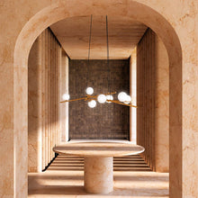 Load image into Gallery viewer, Amara LED Chandelier in living room.