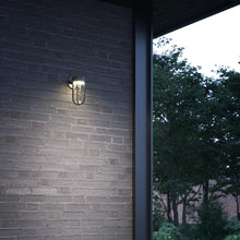 Load image into Gallery viewer, Davy Outdoor LED Wall Light in Outsite Area.