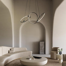 Load image into Gallery viewer, Isho LED Chandelier in living room.
