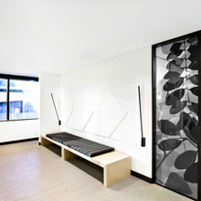 Load image into Gallery viewer, Lever LED Wall Light in living room.