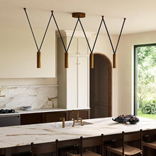 Load image into Gallery viewer, Mason LED Linear Pendant Light in kitchen.