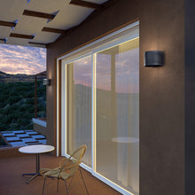 Load image into Gallery viewer, Rene Outdoor LED Wall Light in Outside Area.