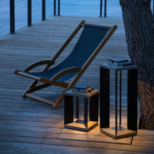 Load image into Gallery viewer, Blade Outdoor Solar LED Lantern in Outside Area.