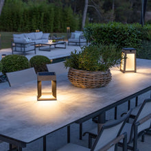 Load image into Gallery viewer, Blade Outdoor Solar LED Table Lamp in Outside Area.