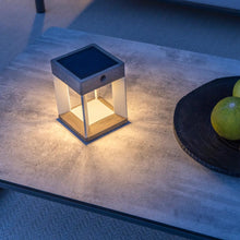 Load image into Gallery viewer, Blade Outdoor Solar LED Table Lamp in Outside Area.