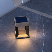Load image into Gallery viewer, Blade Outdoor Solar LED Table Lamp in Outside Area.