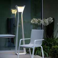Load image into Gallery viewer, Bloom Outdoor Solar LED Floor Lamp in Outside Area.