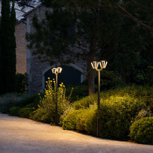 Load image into Gallery viewer, Metro Outdoor Solar LED Floor Lamp in Outside Area.