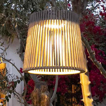 Load image into Gallery viewer, Muse Pendulum Outdoor Solar LED Pendant Light in Outside Area.