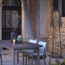 Load image into Gallery viewer, Palma Outdoor Solar LED Floor Lamp in Outside Area.