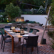 Load image into Gallery viewer, Pendulum Outdoor Solar LED Floor Lamp in Outside Area.