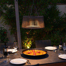 Load image into Gallery viewer, Pendulum Outdoor Solar LED Floor Lamp in Outside Area.