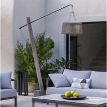 Load image into Gallery viewer, Pendulum Outdoor Solar LED Floor Lamp in Outside Area.