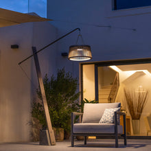 Load image into Gallery viewer, Pendulum Outdoor Solar LED Floor Lamp in Outside Area.