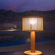 Load image into Gallery viewer, Pixy Outdoor Solar LED Table Lamp in Outside Area.