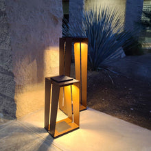 Load image into Gallery viewer, Skaal Outdoor Solar LED Lantern in Outside Area.