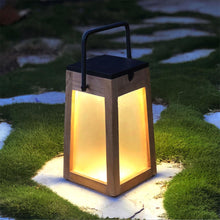 Load image into Gallery viewer, Tecka Outdoor Solar LED Lantern in Outside Area.