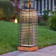 Load image into Gallery viewer, Tekura Outdoor Solar LED Lantern in Outside Area.