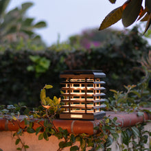 Load image into Gallery viewer, Tekura Outdoor Solar LED Table Lamp in Outside Area.