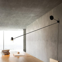 Load image into Gallery viewer, Counterbalance LED Wall Light in living room.